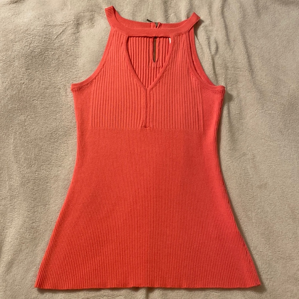Venus! Medium in size! Salmon/orange in colour!